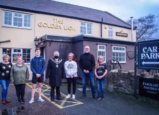 Deputy Mayor, Councillor Brian Cameron meets the staff at the Golden Lion, Coedpoeth