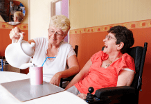 carer pouring a cup of 