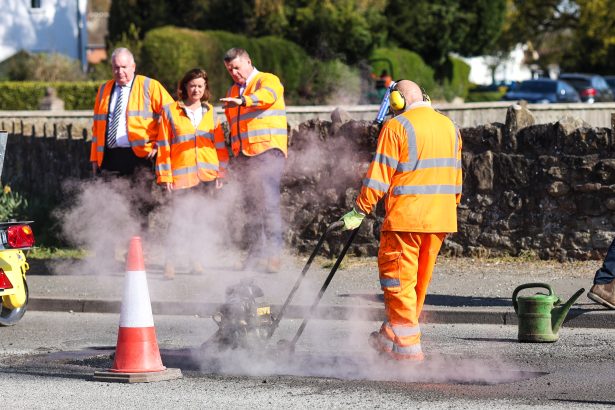 First Minister visits Wrexham to see road maintenance work