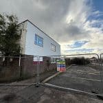 building with fencing surrounding