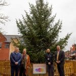 Wrecsam2029 team with Cllr Mark Pritchard and Cllr Nigel Williams in front of the Wrexham Christmas tree 2025