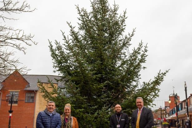 Wrecsam2029 team with Cllr Mark Pritchard and Cllr Nigel Williams in front of the Wrexham Christmas tree 2025