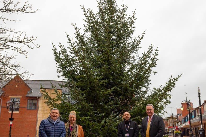 Wrecsam2029 team with Cllr Mark Pritchard and Cllr Nigel Williams in front of the Wrexham Christmas tree 2025