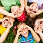 Specialist Children's Centre - children playing in the grass