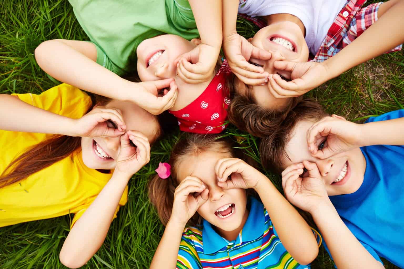 Specialist Children's Centre - children playing in the grass