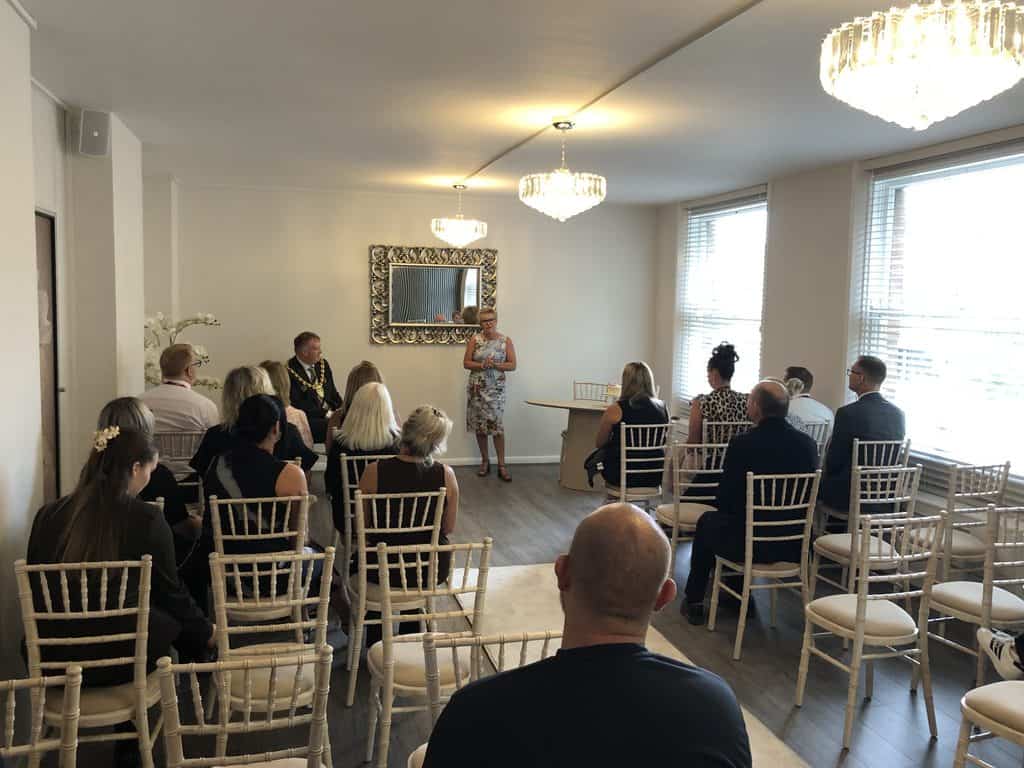 Staff attending the reopening of the ceremony room at the Guildhall